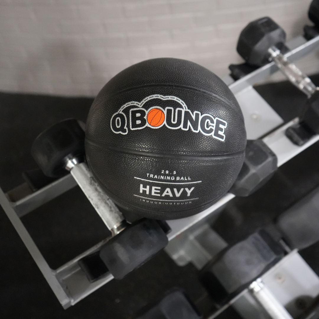 QBounce Weighted Basketball designed to improve strength, ball control, and shooting accuracy with durable, textured grip.
